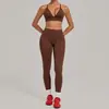 Conjunto de outfit de yoga para correr al aire libre para mujer, sujetador de yoga con tiras de nuevo estilo con pantalones cortos de secado rápido 1358+08101