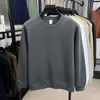 Novas Camisetas de Algodão de Manga Longa para Primavera e Outono Cor Pura Soltas Gola Redonda Pulôveres Casuais Masculinos Camisetas Internas