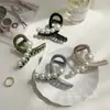 Pinza para el pelo de tiburón pequeño de perla popular en Internet Pinza para el pelo de mujer Pinza para el pelo de la parte posterior de la cabeza Pinza para el pelo semi-recogido Pinza de agarre Pinza de disco para el pelo Tocado