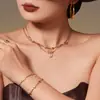 Acero Inoxidable Lazo Corazón Circonita Diamante Completo Colgante Cadena de Cuchilla Pulsera Collar Juego de Joyería Chapado en Oro Real de 18K