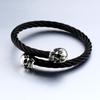 Guerrero de acero Joyería europea y americana al por mayor Pulsera de alambre de acero inoxidable con calavera Pulsera creativa de acero de titanio para hombre Joyería