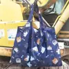 Bolsa de compras ecológica grande Nezha plegable portátil para comestibles fuerte y duradera moda de dibujos animados gran capacidad