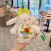 Novo Chaveiro de Coelho de Orelhas Longas Pelúcia Vestido Fofo e Fofo Segurando Flores Boneca Coelho Pingente de Bolsa para Mulheres