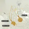 Collar de estilo ins europeo y americano no se decolora al por mayor reloj + huella dactilar redondo de doble cara colgante de acero de titanio accesorios versátiles para mujer