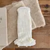 Meias infantis 2026 outono novo estilo meias com borda enrolada e laço meias felpudas brancas fofas para meninas