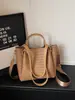 Bolsa de Mão Grande com Textura Trançada Bolsa Tote de PU para Mulheres 2026 Nova Bolsa Saco para o Dia a Dia Versátil de Ombro Único Transversal