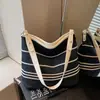 Bolso cruzado casual de gran capacidad para mujer, nuevo modelo 2026, bolso de hombro tipo cubo versátil para estudiantes universitarios y para ir al trabajo