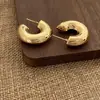 Moderna Colección de Pendientes Dorados Exagerados Huecos de Lujo Ligero Diseño de Nicho Pendientes Versátiles para el Día a Día