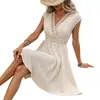 Ropa de mujer para comercio exterior transfronterizo en stock, vestido de encaje hueco con cuello en V estilo resort francés primavera-verano, vestido de línea A con dobladillo pequeño recortado