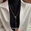 Collar con colgante de ojo de tigre y bola de hoja de circón, cadena de lana Maillard de moda vintage, cadena de cuello ligera de lujo para otoño e invierno.