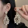Brincos estilo vintage, inspirados em joias de corte, vazados, em formato de gota, com franjas, de design luxuoso e elegante, com strass brilhantes, para mulheres