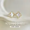 Pendientes de trébol de cuatro hojas de plata pura S999 para mujer, nuevo modelo popular 2026, lujo ligero, elegantes, pendientes de alta gama, hermosos accesorios para la oreja