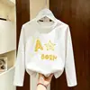 Camiseta de manga larga 100% algodón para niño 2026 primavera y otoño nueva moda estilo coreano camiseta básica para niños, versión coreana camiseta fina de primavera