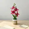 Quatro orquídeas Phalaenopsis artificiais estilo nórdico em vasos de tecido, flores artificiais e plantas verdes para bonsai de mesa, adereços de fotografia e itens decorativos
