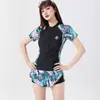 Traje de Baño Nuevo Estilo Dividido para Mujer, Estilo Coreano de Manga Corta con Protección Solar, Cubre Vientre, Adelgazante, Traje de Baño de Dos Piezas con Estampado Tropical