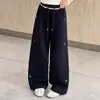 Calça de Moletom Feminina Primavera e Outono 2026 Nova Casual Estilo Coreano Crianças Médias e Grandes Bordado de Laço Calça de Perna Larga Transfronteiriça