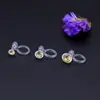 Clip para oreja pequeño japonés transparente con incrustaciones de circonita, aretes de resina transparente para protección del medio ambiente, fabricantes de joyería popular callejera de Internet al por mayor