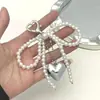 Chaveiro Pingente Coração Laço Pérola Estilo Ins Decoração de Bolsa Pingente DIY Nicho Estiloso Pingente Transfronteiriço