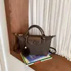Bolsa de Ombro Transversal Versátil Tendência Moda Outono 2026 Bolsa Exclusiva de Bolinho