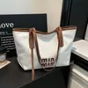 Bolso de hombro nuevo, retro y minimalista, moderno y casual, con gran capacidad, perfecto para la primavera de 2026, un bolso tote para mujer para el trabajo