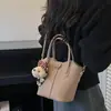 Bolso de mano de nicho estilo coreano transfronterizo para mujer, nuevo bolso tipo cesta de mimbre vintage con patrón de lichi, bolso de hombro y cruzado