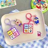 Llavero Colgante Auténtico de Crayon Shin-Chan con Botones Electrónicos de Cuatro Cuadrículas y Sonido Divertido, Juguete de Teclado al por Mayor