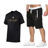 Moda de Verano para Hombre Traje Deportivo Casual Estación Europea Talla Grande Algodón Puro Marca de Moda Camiseta Estampada de Manga Corta Pantalones de Media Longitud