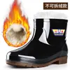 Botas de lluvia para hombre en stock botas altas impermeables protección laboral sitio de construcción antideslizantes engrosadas resistentes al desgaste zapatos de goma PVC rotos zapatos impermeables reemplazo