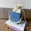 Tendência de Moda Transfronteiriça Cor Sólida Pérola Bolsa Quadrada Pequena 2025 Novo Design de Nicho Bolsa de Ombro com Corrente Versátil e Estilosa