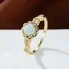 Deseo transfronterizo Anillo de flor de encaje de cuatro garras Aobao AliExpress ronda cuatro anillo Joker para mujer al por mayor