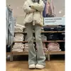 Jeans acampanados vintage lavados teñidos con lodo amarillo para mujer, nuevo estilo primavera y otoño, cintura elástica, corte ajustado, pantalones bootcut favorecedores
