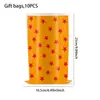 Bolsas de regalo para fiestas de huellas de perro de venta caliente transfronterizas, bolsas de regalo de recuerdo de dibujos animados de fútbol, bolsas de plástico para dulces, suministros de decoración de cumpleaños