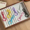 Llavero con resorte de color macarrón para manualidades, colgante creativo para bolsa, llavero colorido, accesorio con hebilla de resorte