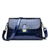 Bolso bandolera de cadena tejida de alta gama para mujer 2026 versátil moderno de un solo hombro nuevo ligero de lujo pequeño estilo francés Chanel