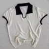 Camiseta de punto sencilla con cuello polo de manga corta y paneles de color contrastante para mujer, nuevo estilo verano 2025, top holgado y adelgazante de manga corta