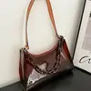 Nova bolsa feminina de moda de verão, bolsa de gelatina fresca estilo ins, bolsa transparente de cor sólida para axila feminina, bolsa de ombro pequena