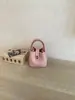 Bolso cubo texturizado de comercio exterior transfronterizo para mujer, 26 modelos nuevos, bolso de mano de alta estética casual, bolso versátil de hombro y cruzado