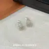 Cesta tejida simple retro estilo francés Pendientes de botón con perla Diseño de nicho de alto valor Pendientes de moda versátiles