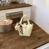Bolsa de Mão Balde com Textura de Lichia de Nicho Coreana Feminina Verão 2026 Nova Textura Bolsa Transversal de Luxo Leve Bolsa de Ombro
