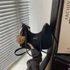 Bolsa de axila meia-lua 2026 outono e inverno novo estilo feminino popular alta qualidade moda ombro bolsa bolinho bolsa transversal