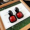 Pendientes de ojo de tigre con aguja de plata de Maillard, pendientes retro de alta gama de estilo Hong Kong, pendientes de temperamento Joker de nicho, venta al por mayor
