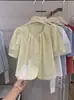 Camisa Feminina Estilo Coreano Gola Redonda Manga Bufante Verão 2025 Nova Solta Fresca Redutora de Idade Elegante Chique Tendência Top