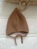 Ins otoño e invierno Corea del Sur bebé lindo gorro de punto con pompón bebé niño y niña protección para las orejas con cordones lana gorro cálido