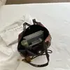Bolsa de gran capacidad para el día a día para mujer, nuevo estilo principios de otoño 2026, bolso tote de lunares moderno y elegante, bolso de hombro y bolso de axila