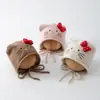 Bonito gorro de orejeras Hello Kitty estilo coreano, gorro cálido con forro de felpa, con cordones para evitar que se caiga, gorro para niños