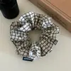 Goma para el pelo de estilo retro a cuadros coreano y japonés con toque artístico para coletas, nueva liga para el pelo para mujer