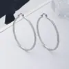 Estilo nuevo delgado adelgazante de cara cara pequeña diseño de nicho textura esmerilada aretes hermoso círculo liso estilo fresco aros redondos clásicos