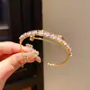 Pulsera Abierta de Múltiples Capas Geométrica Ovalada para Uñas con Circonita de Lujo Ligero Estilo Francés Simple Nicho Joyería de Alta Gama