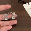 Otoño e invierno Nuevos pendientes de estrella con lazo y circonita diseño de nicho femenino lujo ligero elegantes exquisitos pendientes femeninos