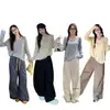Top de cuello en V de hilo de núcleo para mujer, nuevo estilo de otoño 2026, camiseta básica de punto de corte holgado para usar en capas, suéter de invierno